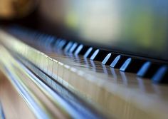 a close up view of the piano keys