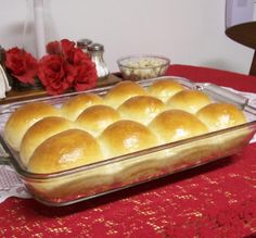 a casserole dish on a red table cloth