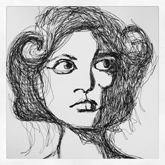 a black and white drawing of a woman's face