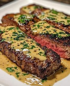 steak with mustard sauce on a white plate