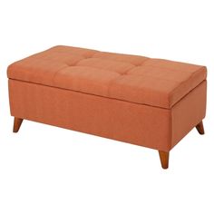 an orange ottoman with wooden legs on a white background