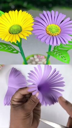 someone is cutting paper flowers out of purple and yellow petals to make them look like they are