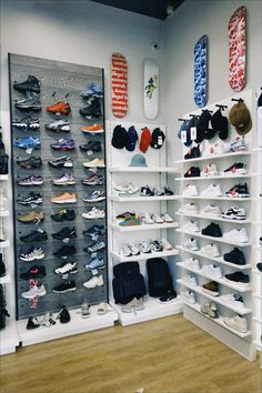 a room filled with lots of shoes and hats