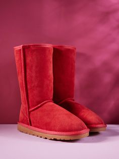 These high quality boots by SMAIBULUN™ Ugg exude elegance and sophistication. Made with premium suede, they provide comfort and style for any occasion. The classic red color adds a touch of vibrancy to your wardrobe. Perfect for the stylish and exclusive individual. 1'' heel 11.5'' shaft 15.5'' circumference Pull-on Suede upper Faux fur lining Man-made EVA sole Red Suede Boots For Winter, Red Mid-calf Boots For Winter Party, Classic Red Winter Boots, Red Winter Mid-calf Boots For Party, Trendy Fitted Red Mid-calf Boots, Red High Ankle Mid-calf Boots For Winter, Red Fitted High Heel Mid-calf Boots, High Quality Boots, Reindeer Headband