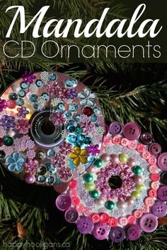 a christmas ornament made out of buttons on a tree with text overlay