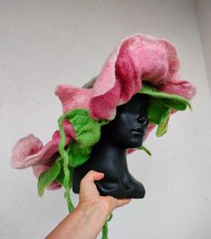 I made this hat using the felting method from merino wool with the addition of viscose fabric and linen fibers. The hat is made in the shape of a voluminous extravagant flower. A wire is inserted into the petals in the form of a longitudinal base of the frame, which allows you to change the shape of the petal. The diameter of the flower can be increased by using wire petals from 38 cm to 55 cm. Height is 30 centimeters. Ideal for creating a luxurious look and themed natural photo shoots Felt Flower Hat, Natural Photo, Flower Hat, Flower Hats, Pink Hat, Felt Hat, Felted Wool, Viscose Fabric, Felt Flowers