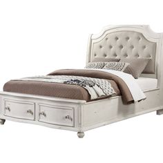 a white bed with two drawers underneath it