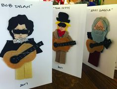 three handmade greeting cards with people playing guitars