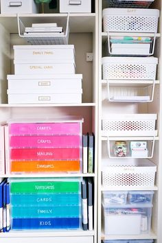 an organized closet with drawers, file cabinets and other office supplies in white plastic bins