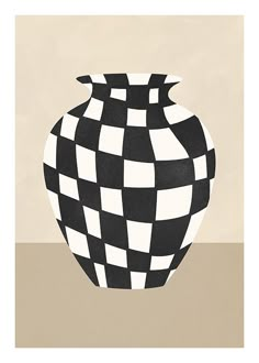 a black and white checkered vase sitting on top of a table next to a wall