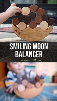 a child playing with a wooden boat made out of wood slices and text reading, smiling moon balancer