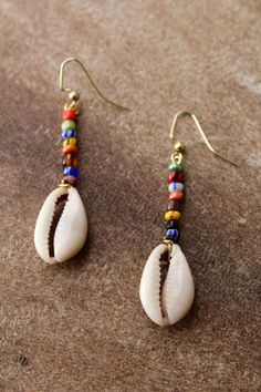 Multicolored cowrie shell drop earrings | Etsy Beach Teardrop Beaded Earrings, Colorful Beaded Teardrop Earrings For Beach, Teardrop Beach Earrings With Colorful Beads, Handmade Teardrop Beaded Earrings For Beach, Teardrop Earrings With Colorful Beads For Beach, Teardrop Beach Jewelry With Colorful Beads, Beach Teardrop Beaded Earrings For Pierced Ears, Teardrop Beaded Earrings For Beach, Summer Teardrop Beaded Earrings For Beach