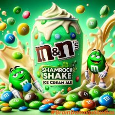 an advertisement for m & m's ice cream with two green characters in front of it