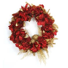 a wreath with red flowers and gold leaves