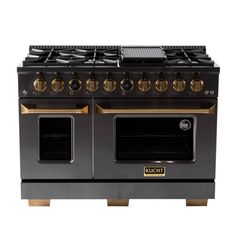 a black and gold stove with two ovens on it's sides, against a white background