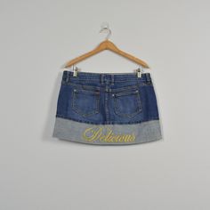 "denim two tone mini skirt, with fold detail, delicious embroidered. Condition: good! Some light wear on the buttons Brand: n:/a Color: medium wash (color is most accurate in flat lay images) Tag Size: 13 (please view measurements for accurate sizing) MEASUREMENTS: Waist (doubled): 35-36\" Hips (doubled): 41-42\" Length 12.75\" BEFORE PURCHASING PLEASE MAKE SURE TO MEASURE YOURSELF!  All pants are normally a little darker than the image because of the camera and studio lights. Please remember th Tailgating Outfits, 2000s Low Rise, Tailgate Outfit, Studio Lights, Spring Clothes, Virtual Closet, Denim Mini, Fit Inspo, Denim Mini Skirt