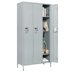 a large gray locker with two doors and a tennis racket on the bottom shelf