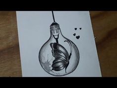 an ink drawing of a light bulb with a butterfly inside it and hearts floating in the air