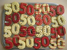 decorated cookies in the shape of letters and numbers