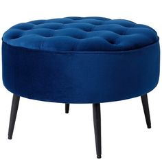 a round blue ottoman with black legs