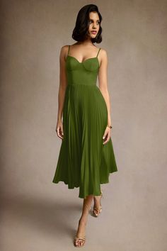 Our Emma Pleated Midi Dress is cut from stretch satin. She features a V neckline paired with adjustable spaghetti straps and a pleated A line skirt. Wear this style to your next event. Olive Green Formal Dress, Wedding Rehearsal Dress, Cocktail Dress Code, Atelier Dress, Green Formal Dresses, Military Ball Dresses, Special Event Dresses, Fall Wedding Guest Dress, Olive Green Dresses