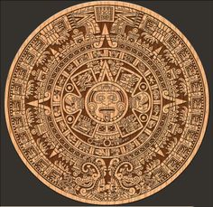 a wooden clock with an intricate design on the face and numbers in different languages,