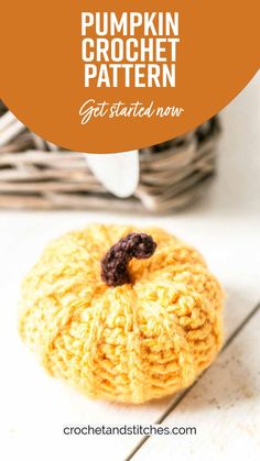 a crocheted pumpkin sitting on top of a table