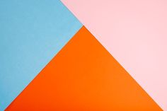 an orange, blue and pink background is shown in this image from the top view