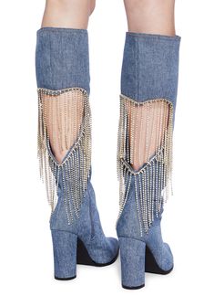 cuz let's party. These boots have a denim construction, a cut out heart design with rhinestone fringe on the back, a pointed toe design, block heels, and side zipper closures. Fall Party Denim Blue Jeans, Denim Pointed Toe Boots For Party, Denim Blue Pointed Toe Party Boots, Party Denim Blue Pointed Toe Boots, Spring Boots With Rhinestone Fringe, Chic Denim Blue Jeans For Party, Trendy Fringe Boots For Party, Trendy Party Boots With Fringe, Party Jeans With Rhinestone Fringe