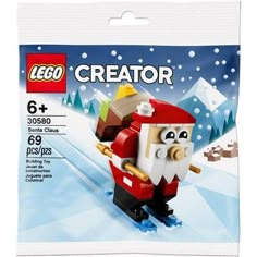 a package of lego creator minifigurs with santa claus on the snow covered mountain