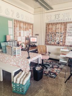 a room filled with lots of desks and chairs