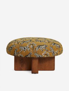 the foot stool has an animal print on it