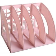 three pink paper holders sitting on top of each other