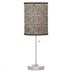 a lamp with a leopard print shade on it