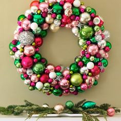 a christmas wreath is hanging on the wall