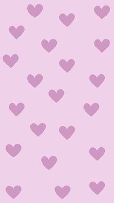 a pink background with hearts on it