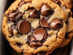 two chocolate chip cookies in a box on a table