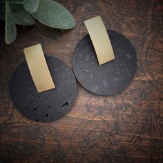 Boho Black & Gold Circle Cork Earrings, the color is a very beautiful black. These are a part of Red Shed Designs’ Cork Collection. These are very trendy, lightweight and truly unique earrings. This earring is made from natural cork and measures approximately 1 1/2". Red Shed Designs creates unique hand-crafted Boho inspired jewelry pieces to make a bold statement. Each piece is handmade, and due to the nature of materials, each piece has slight variances, the shades of material are all-natural Shed Designs, Cork Collection, Red Shed, Cork Jewelry, Cork Earrings, Wooden Accessories, Shed Design, Gold Circle, Light Weight Earrings