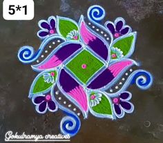 an artistic design on the ground for diwaling with colorful flowers and leaves painted on it