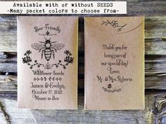 two tags with bees on them sitting next to each other