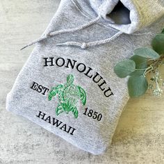 Embroidered Beach Sweatshirt, Honolulu Hawaii Hoodie, City Hoodie, Embroidered Hawaii Hoodie, Embroidered City Sweatshirt, Gray, Turtle, Trendy, Hawaii Sweatshirt, Custom Sweatshirt We offer a variety of custom made embroidery apparel.   See photos above for size and color options.   Our crewneck sweatshirts and hoodies come in  size S - 2XL. Please choose from the dropdown menu what size and color you'd like.  In the notes at checkout, please let me know the thread colors you'd like on your clo Hawaii Sweatshirt, Hawaii Hoodie, City Sweatshirt, Aesthetic Sweatshirt, Beach Sweatshirt, Sweatshirt Aesthetic, Sweatshirt Graphic, Sweatshirt Trendy, Embroidery On Clothes