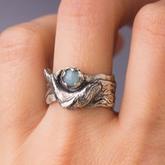 "Humpback whale swimming in the ocean ring. * The ring was made in the lost wax technique, it was hand carved in wax and was casted in sterling silver. * Made of Sterling silver 925. * Genuine gemstones in 5 mm to choose from: Amazonite, Amethyst, Garnet, Iolite, Quartz, Onyx, Rainbow moonstone, Labradorite, Carnelian, Lapis lazuli, Ethiopian opal, Rose quartz, Rutilated quartz. In faceted stones, different setting: genuine Tourmaline and genuine blue Sapphire, blue topaz. * The ring width on th Etsy Jewelry Rings, Ocean Ring, Amazonite Ring, Animal Ring, Cleaning Silver Jewelry, Ocean Jewelry, Sea Animal, Animal Rings, Humpback Whale