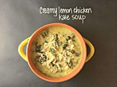 creamy lemon chicken kale soup in an orange bowl on a black surface with the words, creamy lemon chicken kale soup