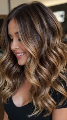 Fall-ing for Color: 15 Hair Inspo Ideas for Every Shade of Brunette - Inspire Inlet Fall Blonde For Brunettes, Fall Hair Balayage Colors, Fall Hair Colors Dark Blonde, Fall Glaze Hair, Fall Hair Olive Skin Tone, Natural Blonde With Brown Lowlights, Fall Hair Color For Brunettes Ombre, Fall Hair Colors Medium Length, Carmel Ombre Brunettes