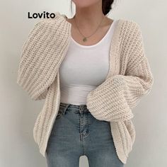 Transforme seu guarda-roupa com o Lovito Cardigan Básico Liso Casual para Mulheres, em um impecável tom Branco, modelo LNA29158! 🤍🧥 Essencial para qualquer estação, este cardigan une a simplicidade do casual a uma elegância atemporal. Perfeito para compor sobre camisas, vestidos ou tops, ele adiciona uma camada de conforto e classe ao seu visual diário. Com o #CardiganLovitoBranco, explore a versatilidade e a pureza deste tom clássico, ideal para looks de trabalho ou para aquele encontro casual. Este cardigan não é somente uma peça básica; é um elemento chave para uma moda elegante e sofisticada. Eleve o básico a um novo patamar com Lovito! #PuroEstilo #CardiganElegante #LovitoLNA29158 Lantern Sleeve Sweater, Beige Vest, Elegant Sweater, Cardigan Beige