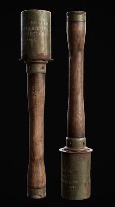 two old wooden objects on a black background