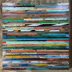 a piece of wood that has been painted with different colors