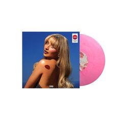 a pink vinyl record with a woman's face on it