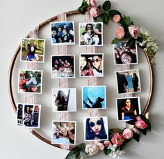 a circular wooden frame with pictures and flowers on it