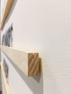 a piece of wood is mounted on the wall